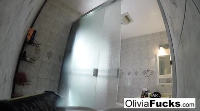 Olivia washes off after a long day