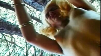 Tattooed guy blows a blonde shemale with hairy cock and bangs her asshole outdoor