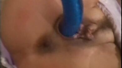 Nasty whore sticks a toy in her fuck holes and squirts before two guys pound her hard