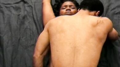 Fat black woman gets her wet cunt railed by a massive man on the floor