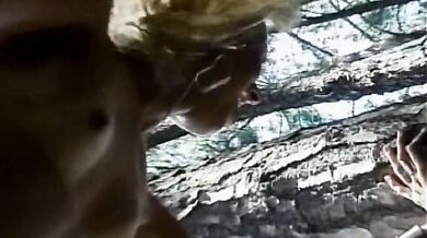 Blonde shemale and a guy lick and pump their asses outside