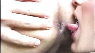 Tattooed guy and a sexy shemale lick and bang their asses outside