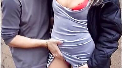 Horny girl strokes a dude with big dick outside before getting inside having intense sex