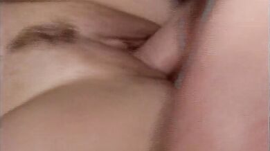 Sexy babe masturbates on the bed and gets her cunt pounded by a dude with glasses