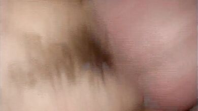 Sexy babe masturbates on the bed and gets her cunt pounded by a dude with glasses